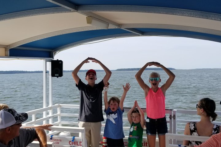 Kids spelling Ohio on a Dolphin Boat Tour in Hilton Head